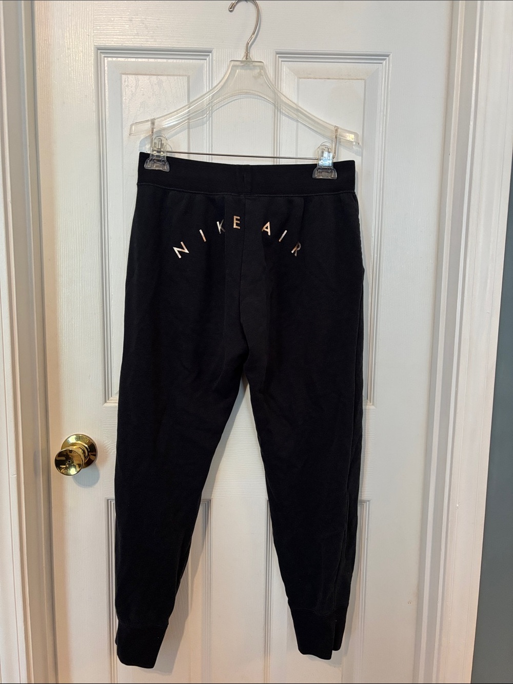 Nike Black Women’s Sweatpants with 'Nike Air' Logo on front and back.